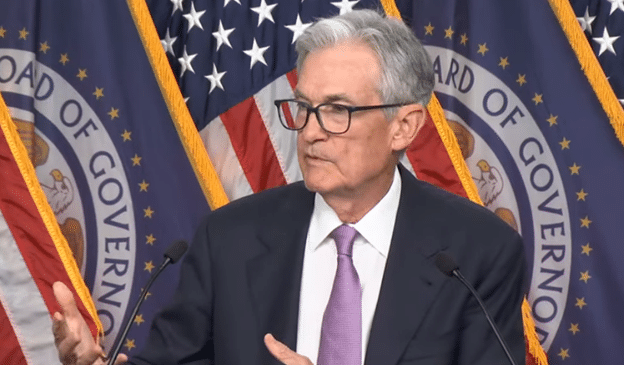 Fed cuts interest rates as Powell acknowledges “cooling” labor markets. Central bank projects unemployment to continue rising.